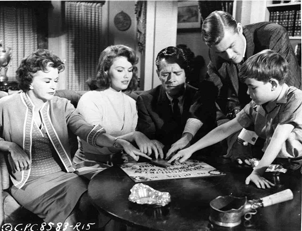 The family conduct a seance - (l to r) Rosemary DeCamp, Jo Morrow, Donald Woods, Martin Milner and Charles Herbert in 13 Ghosts (1960)