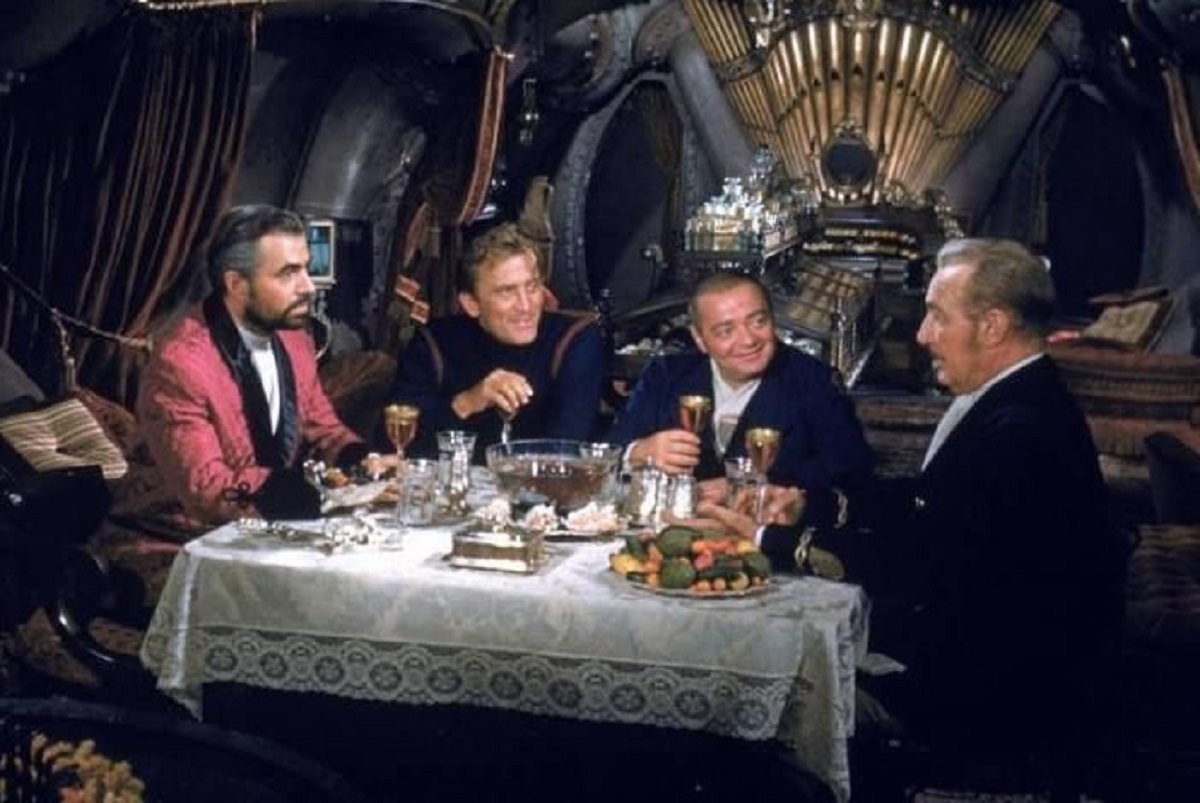 All aboard The Nautilus - (l to r) Captain Nemo (James Mason), Ned Land (Kirk Douglas), Conseil (Peter Lorre) and Professor Arronax (Paul Lukas) in 20,000 Leagues Under the Sea (1954)