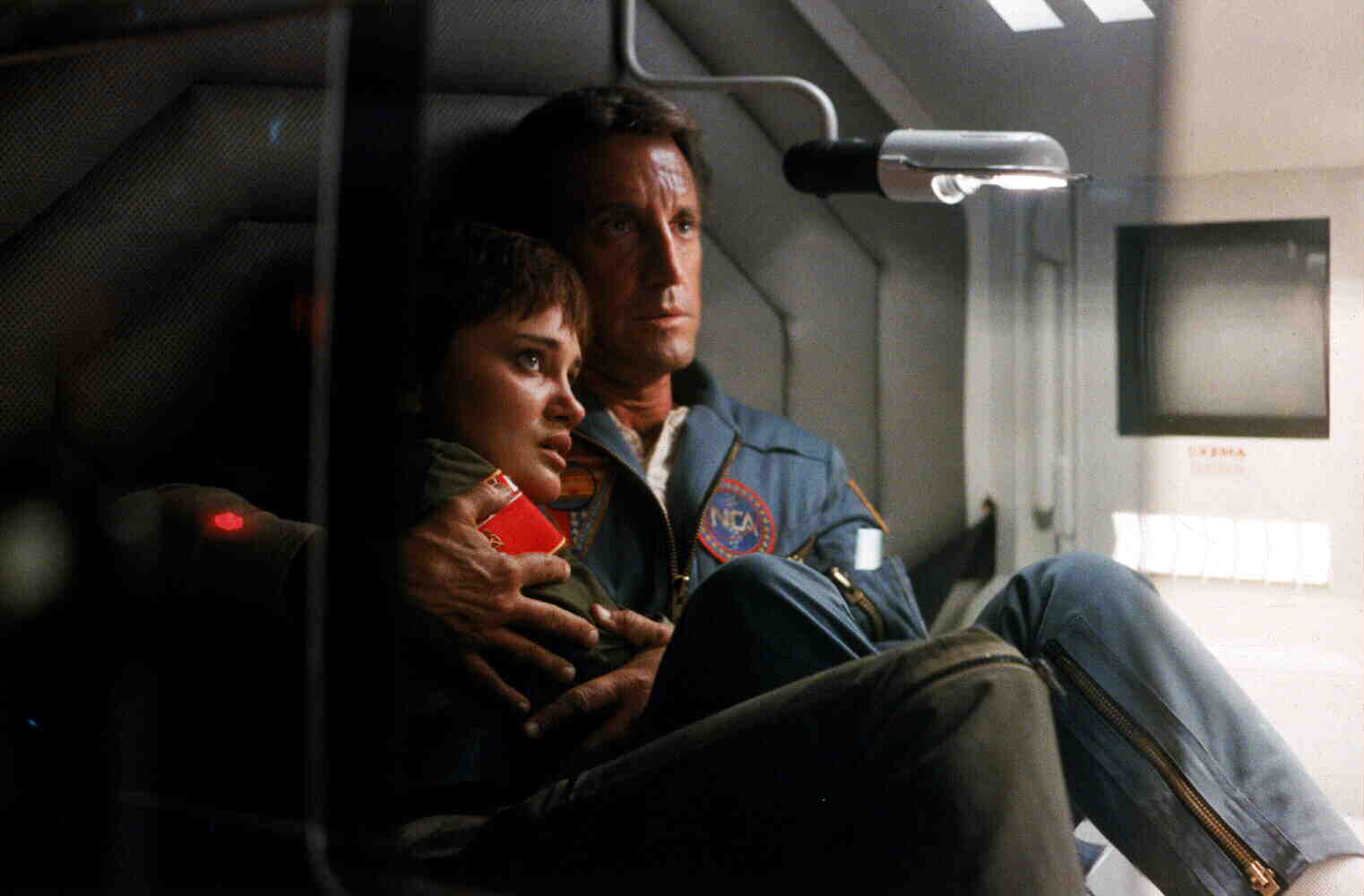 Dr Heywood Floyd (Roy Scheider) comforts cosmonaut Natasha Shneider during the slingshot in 2010 (1984)