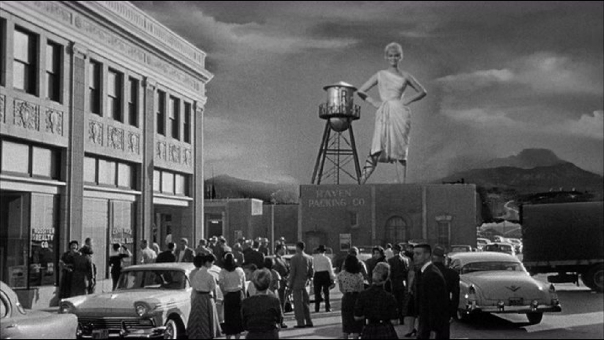 The thirty foot bride (Dorothy Provine) towers over the town in The 30 Foot Bride of Candy Rock (1959)