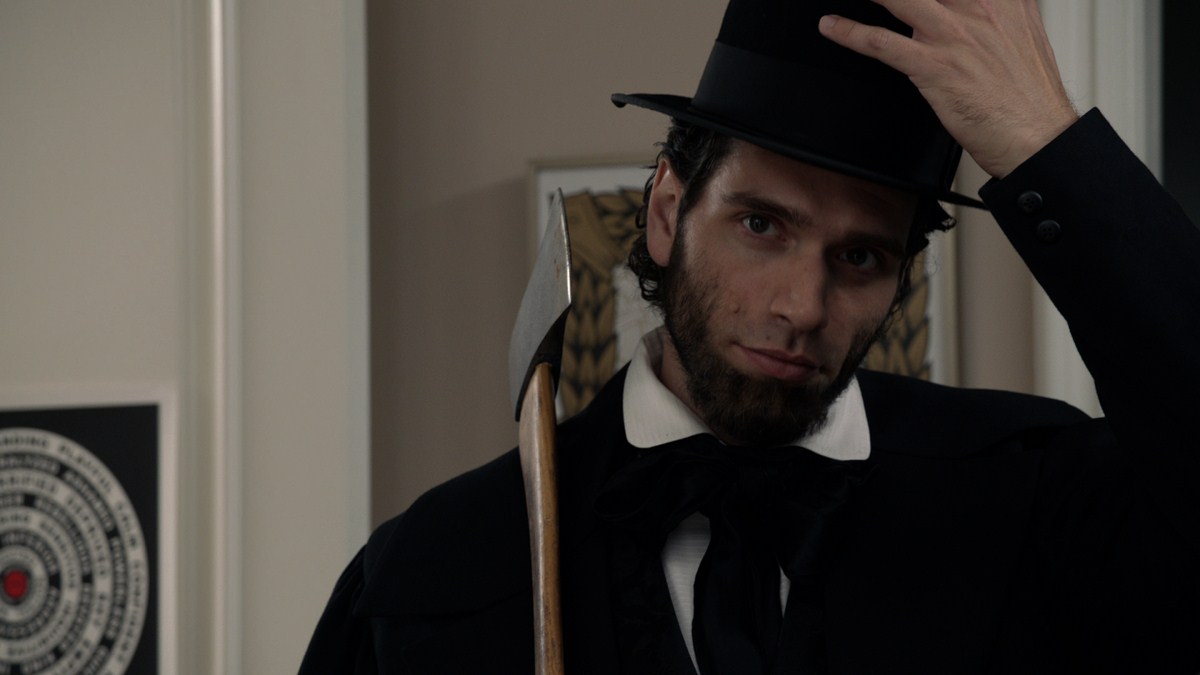 Ben Morrison as next-door neighbour Abe Lincoln in 30 Nights of Paranormal Activity with the Devil Inside the Girl with the Dragon Tattoo (2013)