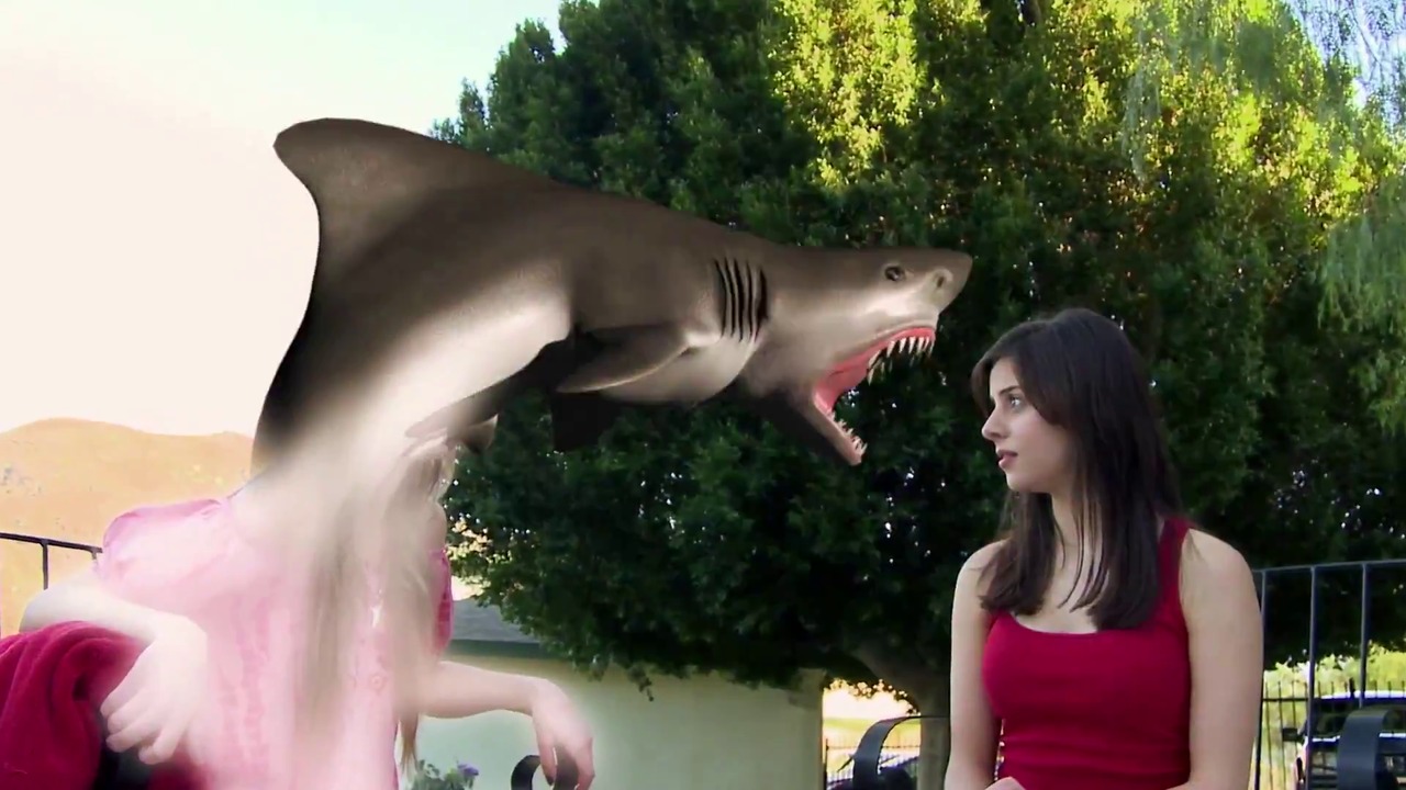 Rachel Rosenstein gets her head bitten off by a shark in 90210 Shark Attack (2014)