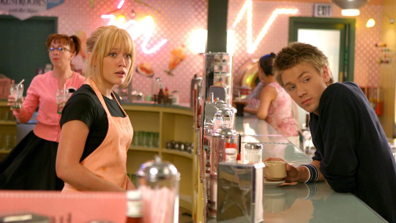 A modernised Cinderella with Hillary Duff working as a waitress and Chad Michael Murray as the captain of the football team in A Cinderella Story (2004)