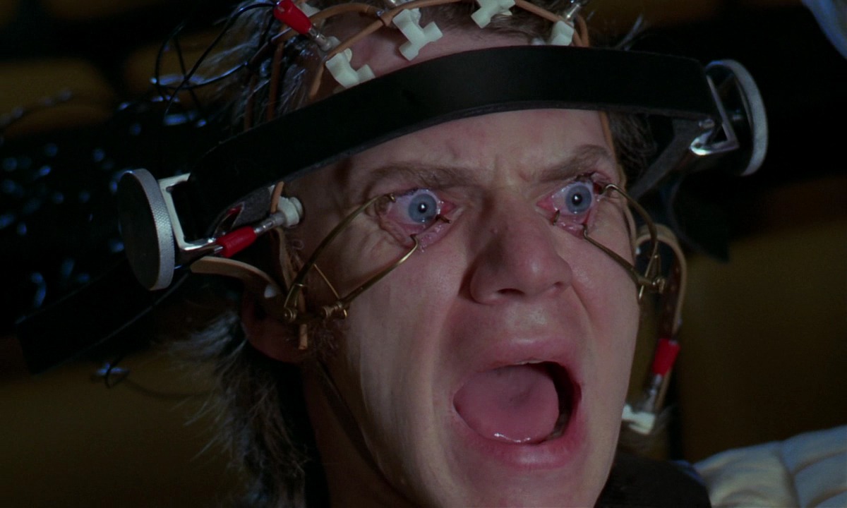 Alex (Malcolm McDowell) undergoes the Ludovico Treatment in A Clockwork Orange (1971)