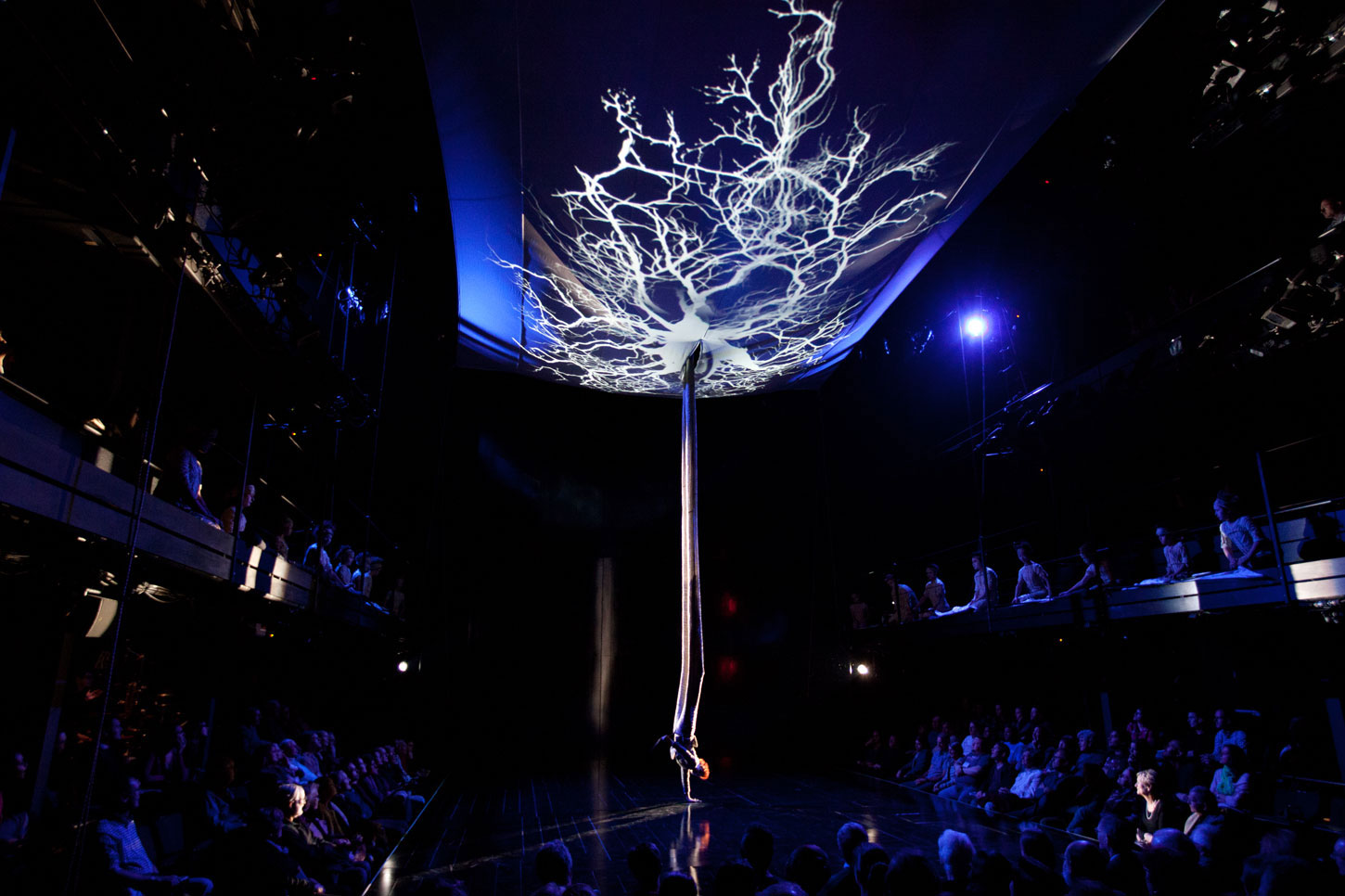 Kathryn Hunter descends to the stage in giant leggings in the opening sequence of A Midsummer Night's Dream (2014)