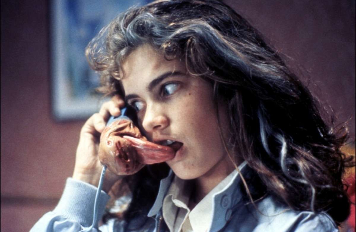 Nancy (Heather Langenkamp) answers the phone in A Nightmare on Elm Street (1984)