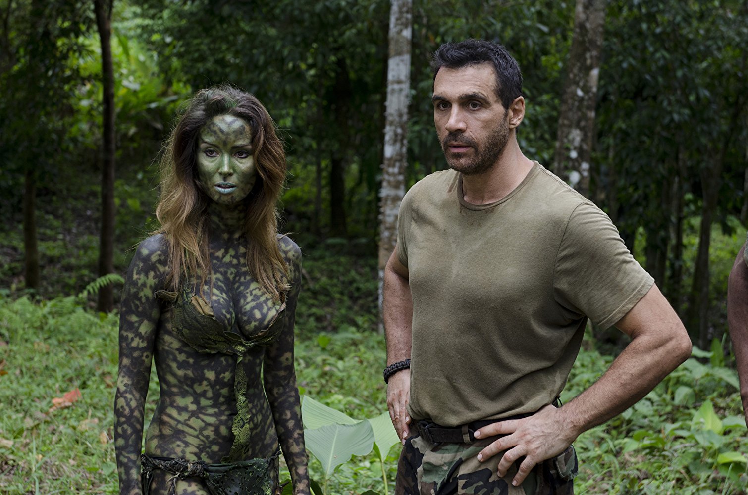 Lieutenant Frank Baum (Adrian Paul) and his alien love interest Lea (Bali Rodriguez) in AE: Apocalypse Earth (2013)