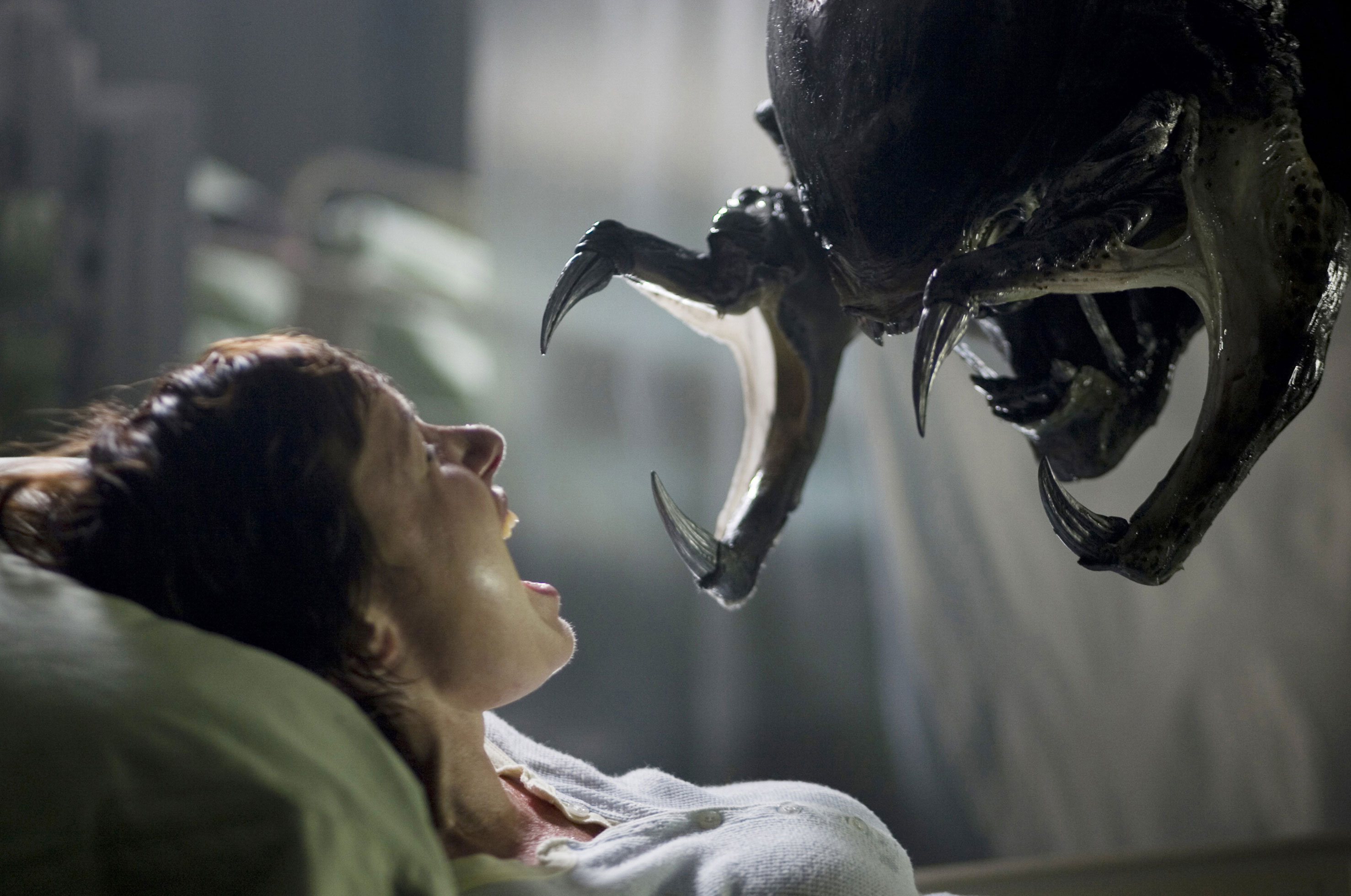 The alien goes to impregnate a pregnant woman (Victoria Bidewell) in AVPR Aliens vs Predator Requiem (2007)