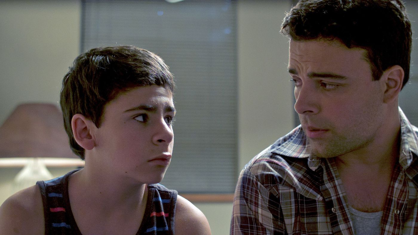Aaron Diaz (James Martinez) (r) and son Tate (Trevor Stovall) in Aaron's Blood (2016)