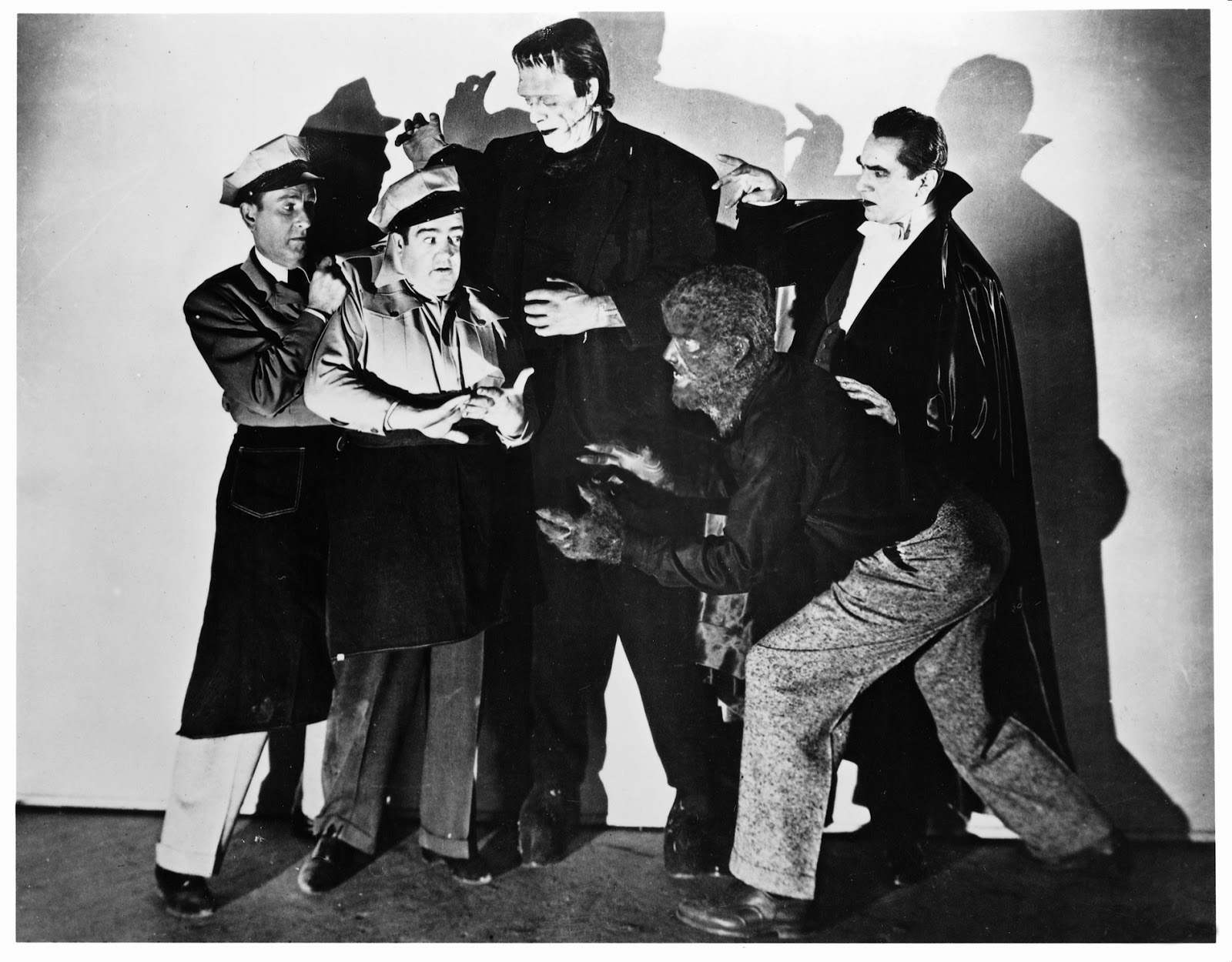 (l to r) Bud Abbott and Lou Costello meets the monsters - The Frankenstein Monster (Glenn Strange), Larry Talbot, The Wolf Man (Lon Chaney Jr) and Count Dracula (Bela Lugosi) in Abbott and Costello Meet Frankenstein (1948)