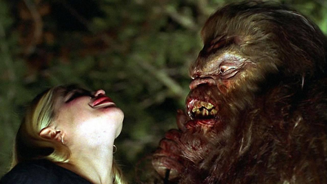 Bigfoot goes to bite Haley Joel's head off in Abominable (2006)