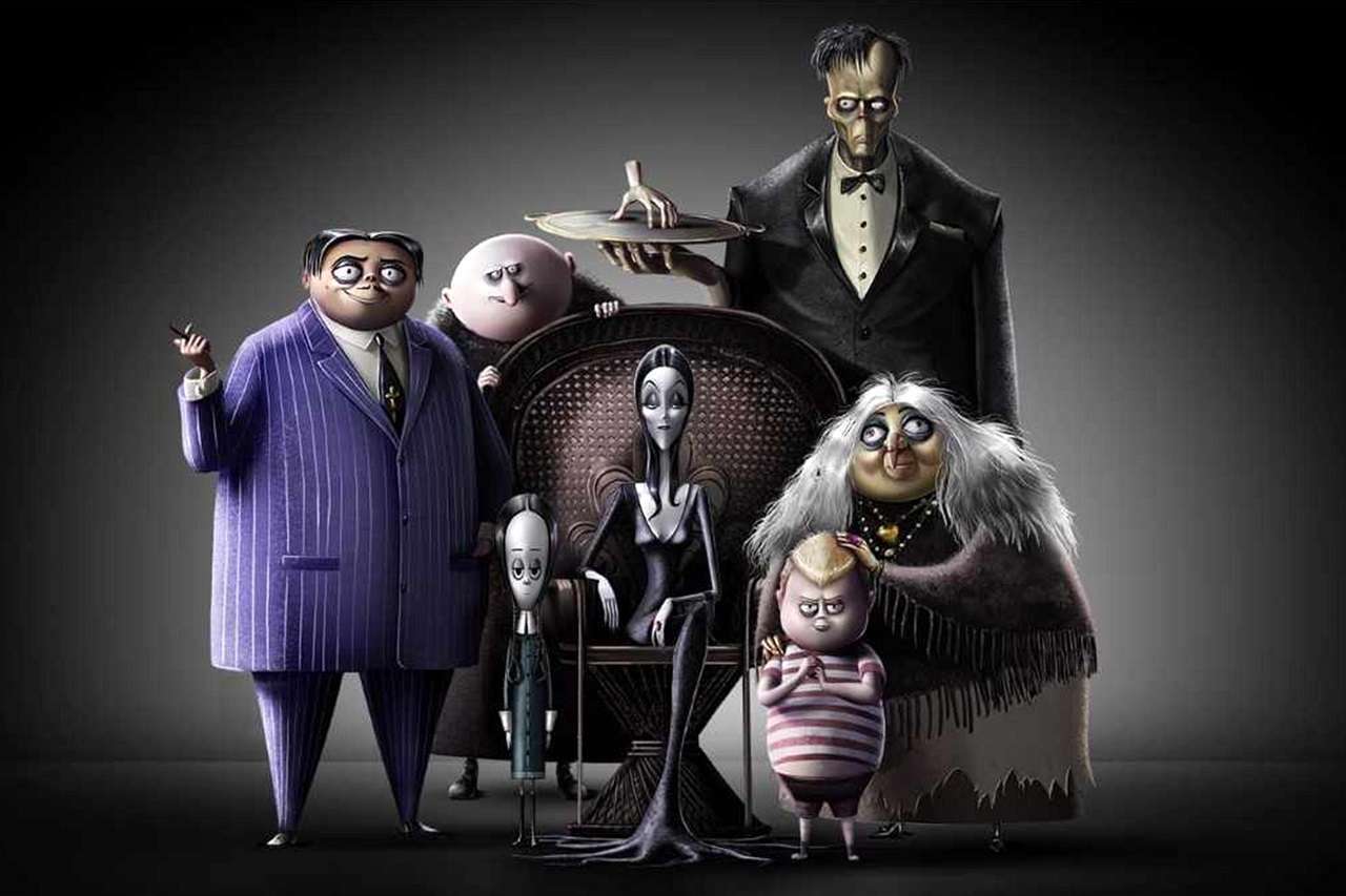 The animated Addams Family - (clockwise from left) (Gomez (voiced by Oscar Isaac), Uncle Fester (voiced by Nick Kroll), The Thing, Lurch, Grandma (voiced by Bette Midler), Pugsley (voiced by Finn Wolfhard), Morticia (voiced by Charlize Theron) and Wednesday (voiced by Chloe Grace Moretz) in The Addams Family (2019)