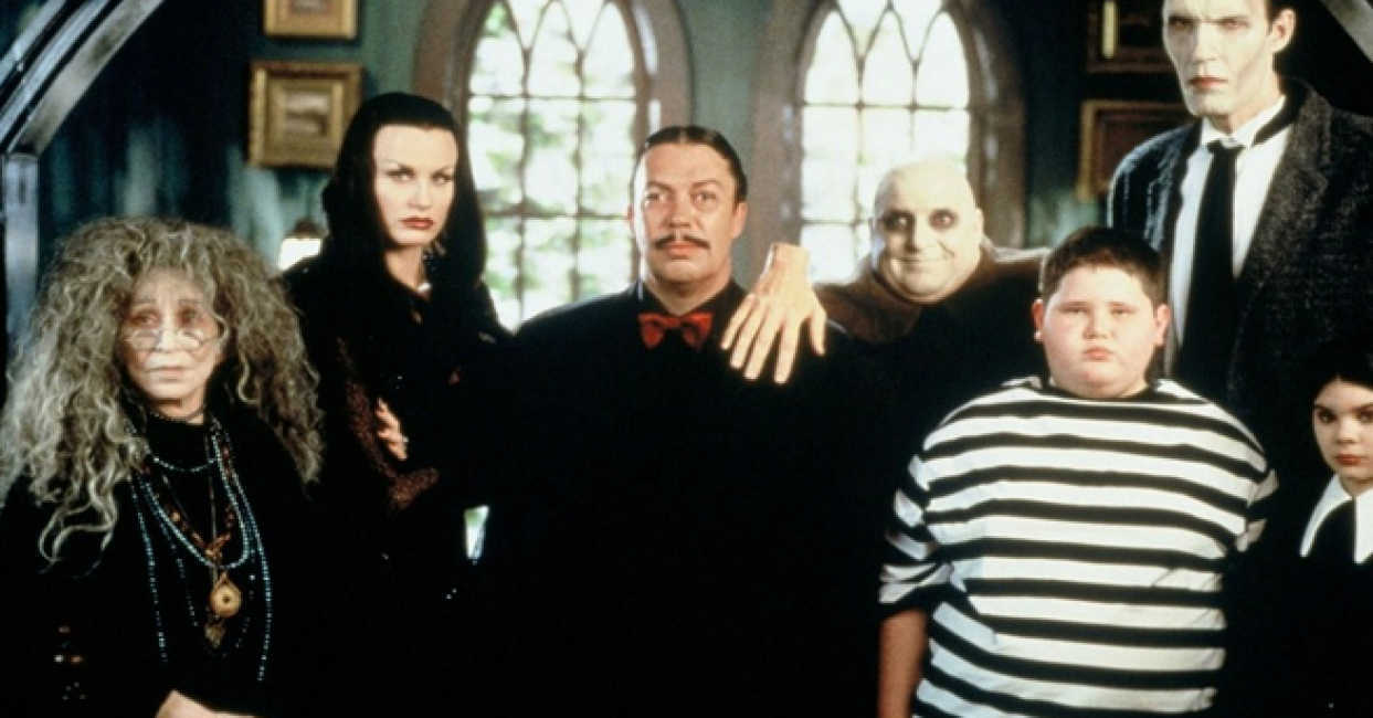 The Addams Family - (l to r) Granny (Alice Ghostley), Morticia (Darryl Hannah), Gomez (Tim Curry), Uncle Fester (Pat Thomas), Pugsley (Jerry Messing), Lurch (Carel Struycken) and Wednesday (Nicole Fugere) in Addams Family Reunion (1998)