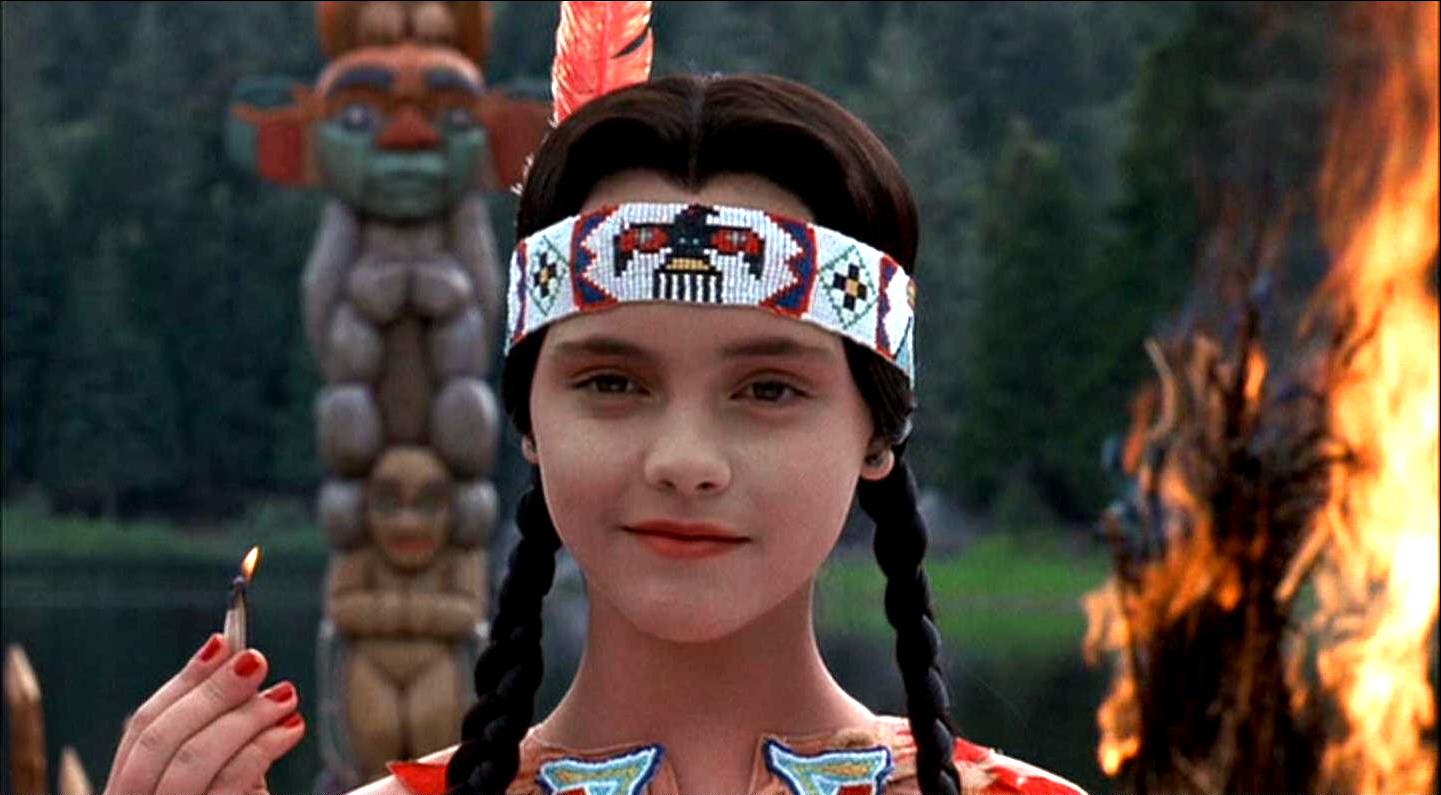 Wednesday (Christina Ricci) incites an uprising at summer camp as Pocahontas in Addams Family Values (1993)