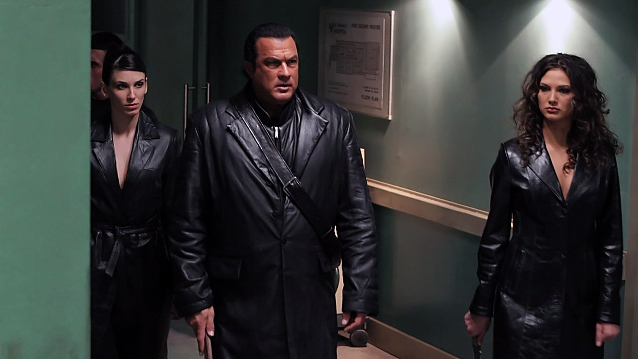 (l to r) Emma Catherwood, Steven Seagal and Andreea Ungureanu go hunting zombies in Against the Dark (2009)