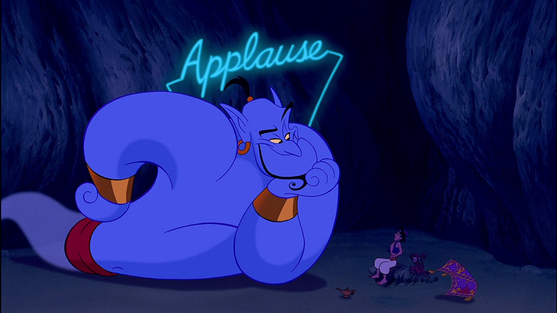 Much of the show overrun by a manically wisecracking Robin Williams as the Genie (l). With Aladdin (voiced by Scott Weinger) and Abu the monkey (bottom right) in Aladdin (1992)