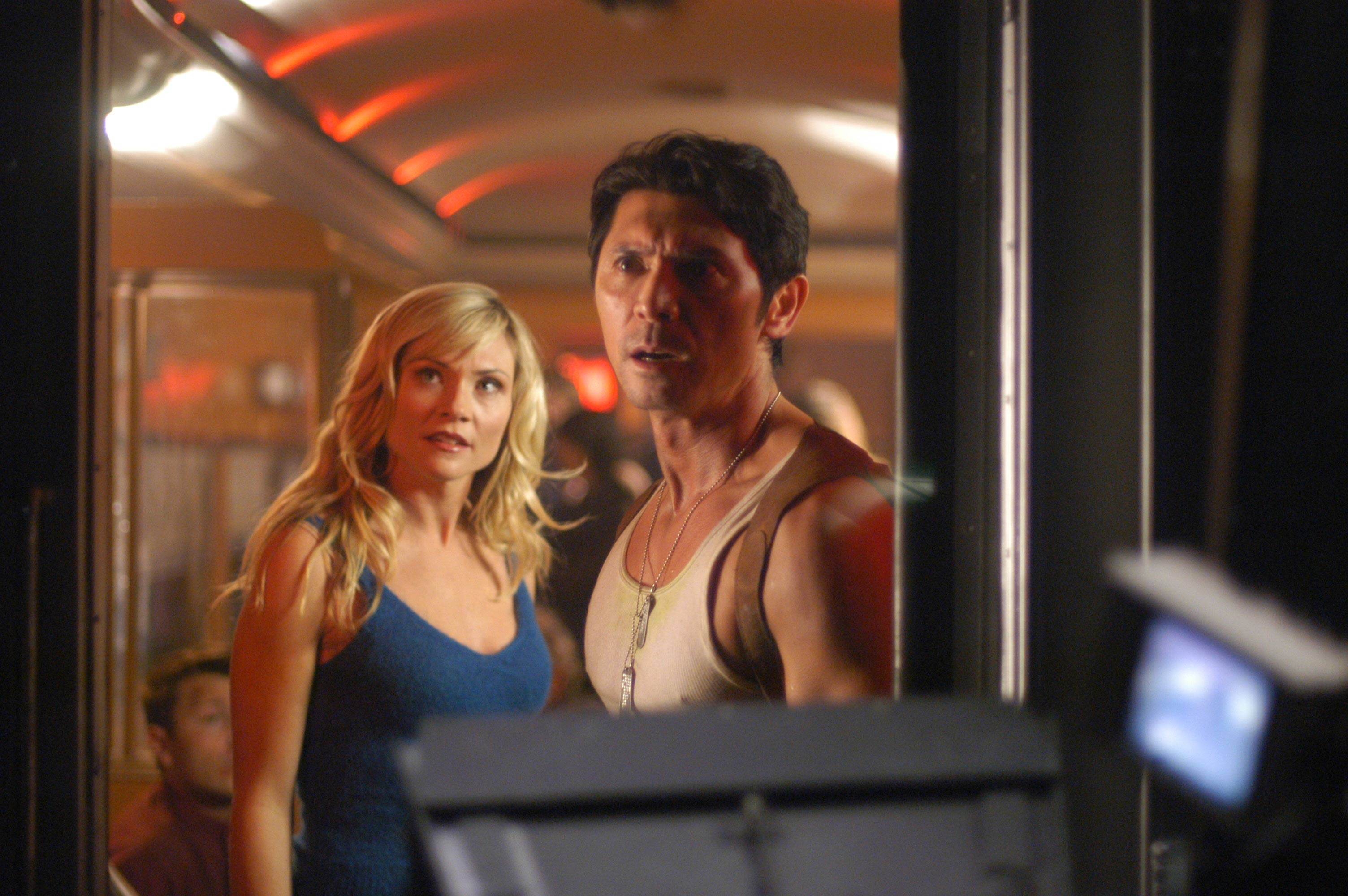 Amy Locane and Lou Diamond Phillips in Alien Express (2005)