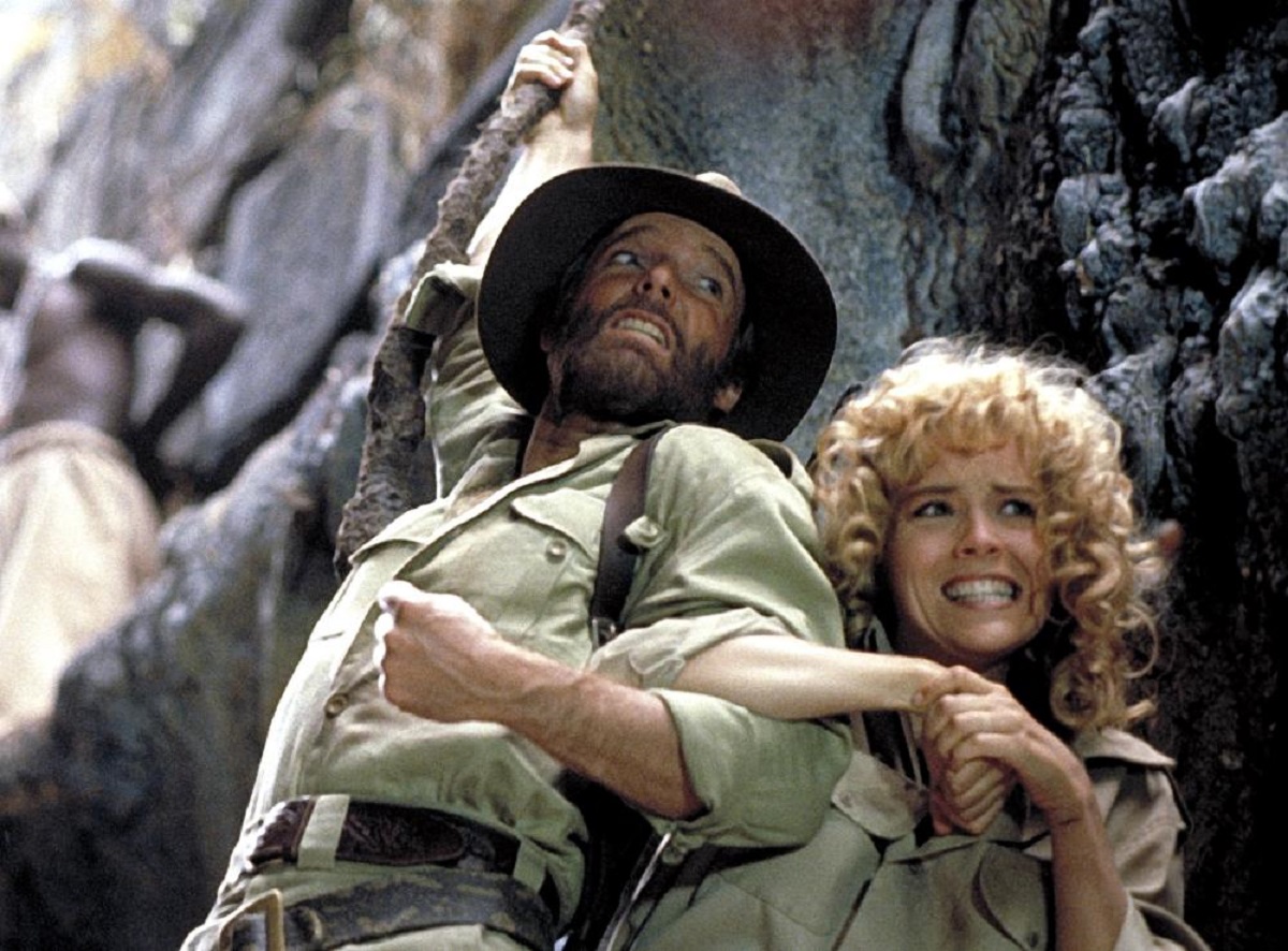 (l to r) Allan Quatermain (Richard Chamberlain) and Jesse Houston (Sharon Stone) in Allan Quatermain and the Lost City of Gold (1986)