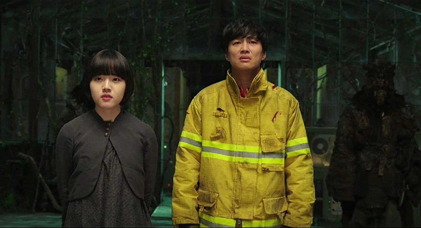 Firefighter Cha Tae-hyun guided through the afterlife by guardian Kim Hyang-gi in Along With the Gods: The Two Worlds (2017)