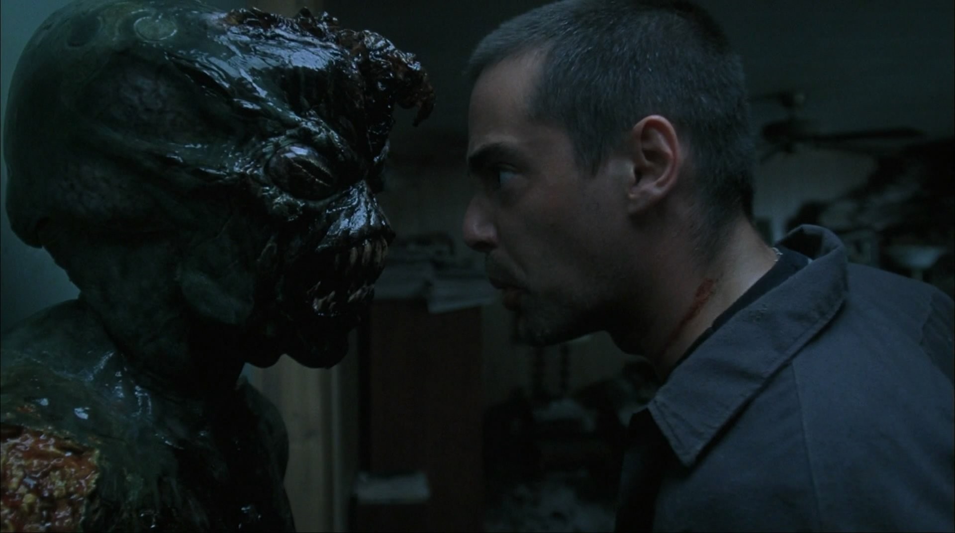 Adam Kaufman and the alien in Altered (2006)