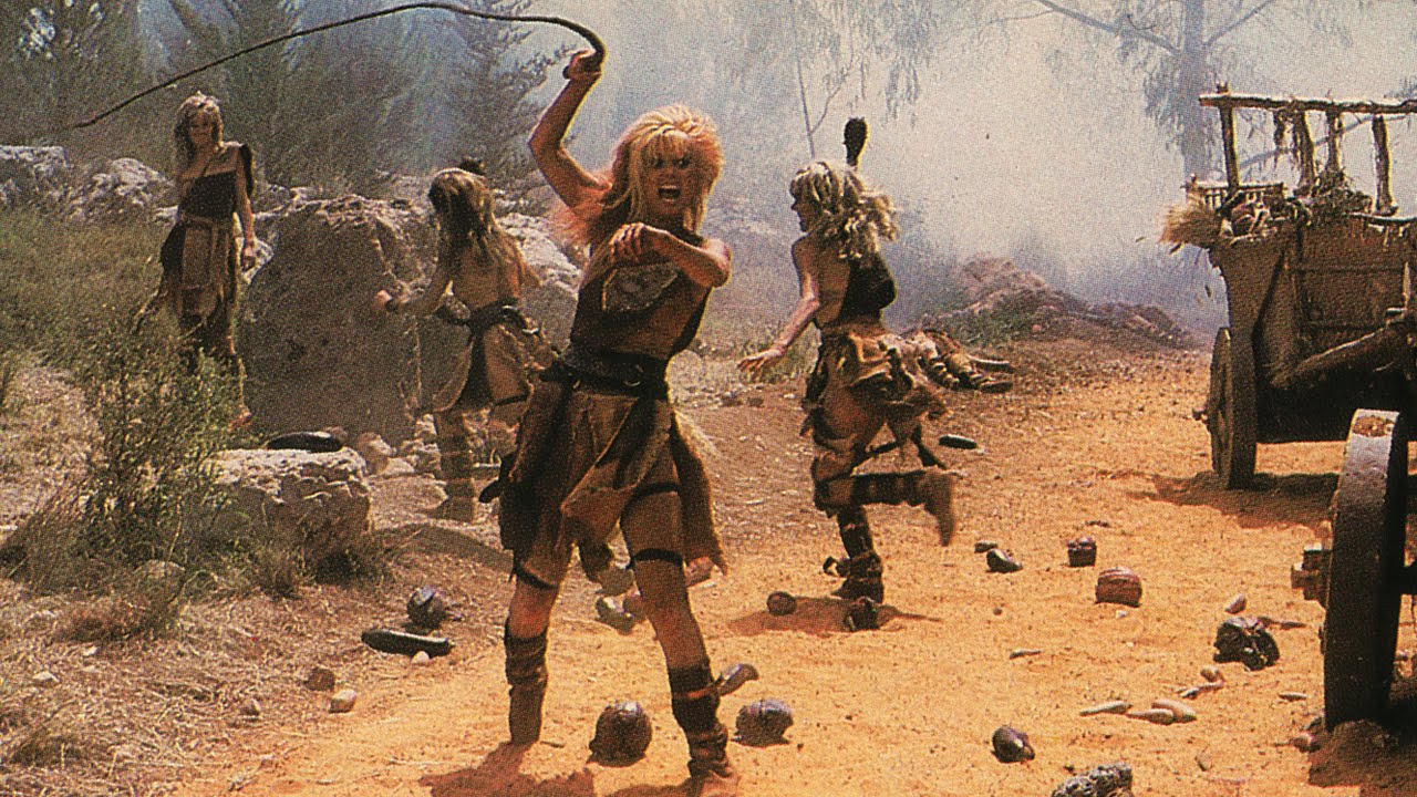 A whip-wielding Laurene Landon in America 3000 (1986)