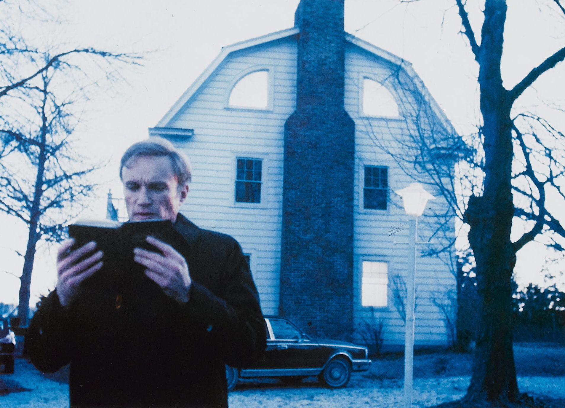 Priest James Olson prepares to sort out the Amityville house in Amityville II The Possession (1982)