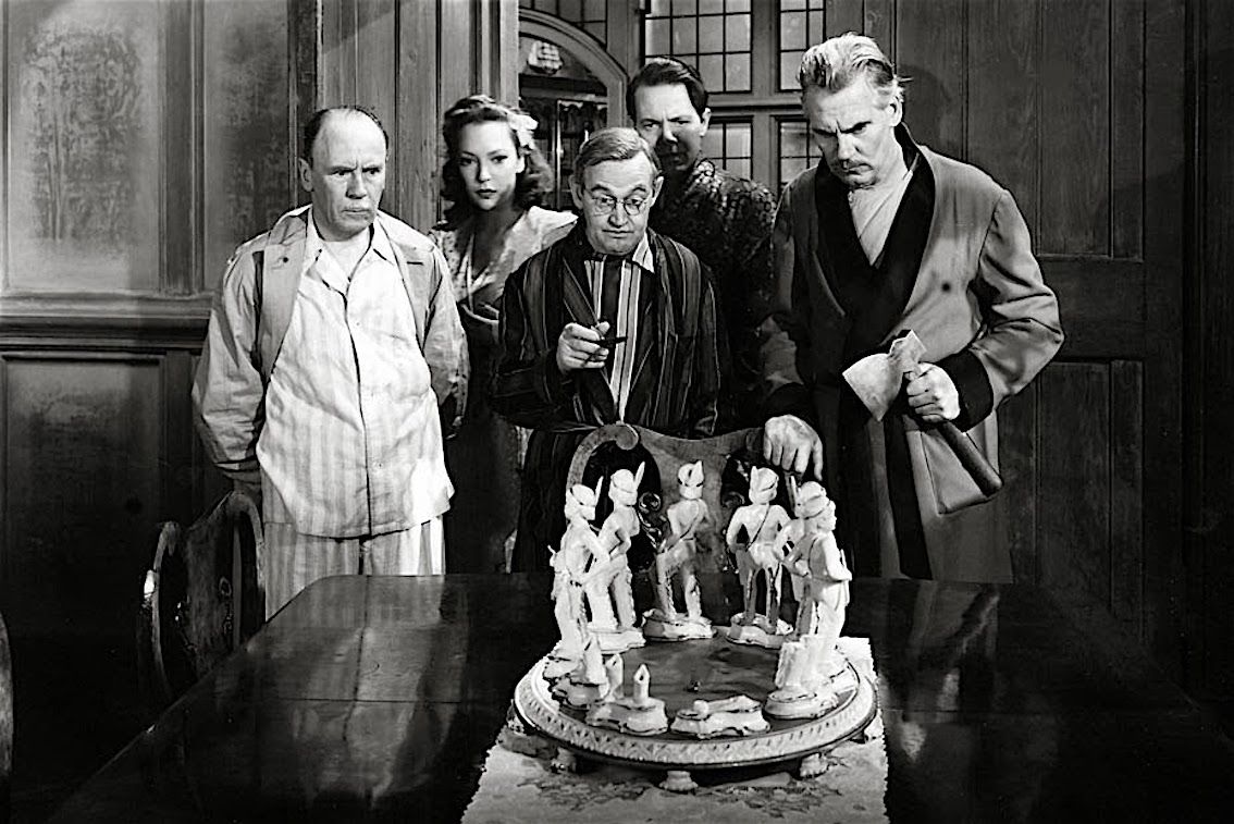 Roland Young, June Duprez, Barry Fitzgerald, Louis Hayward and Walter Huston with the Ten Little Indians in And Then There Were None (1945)