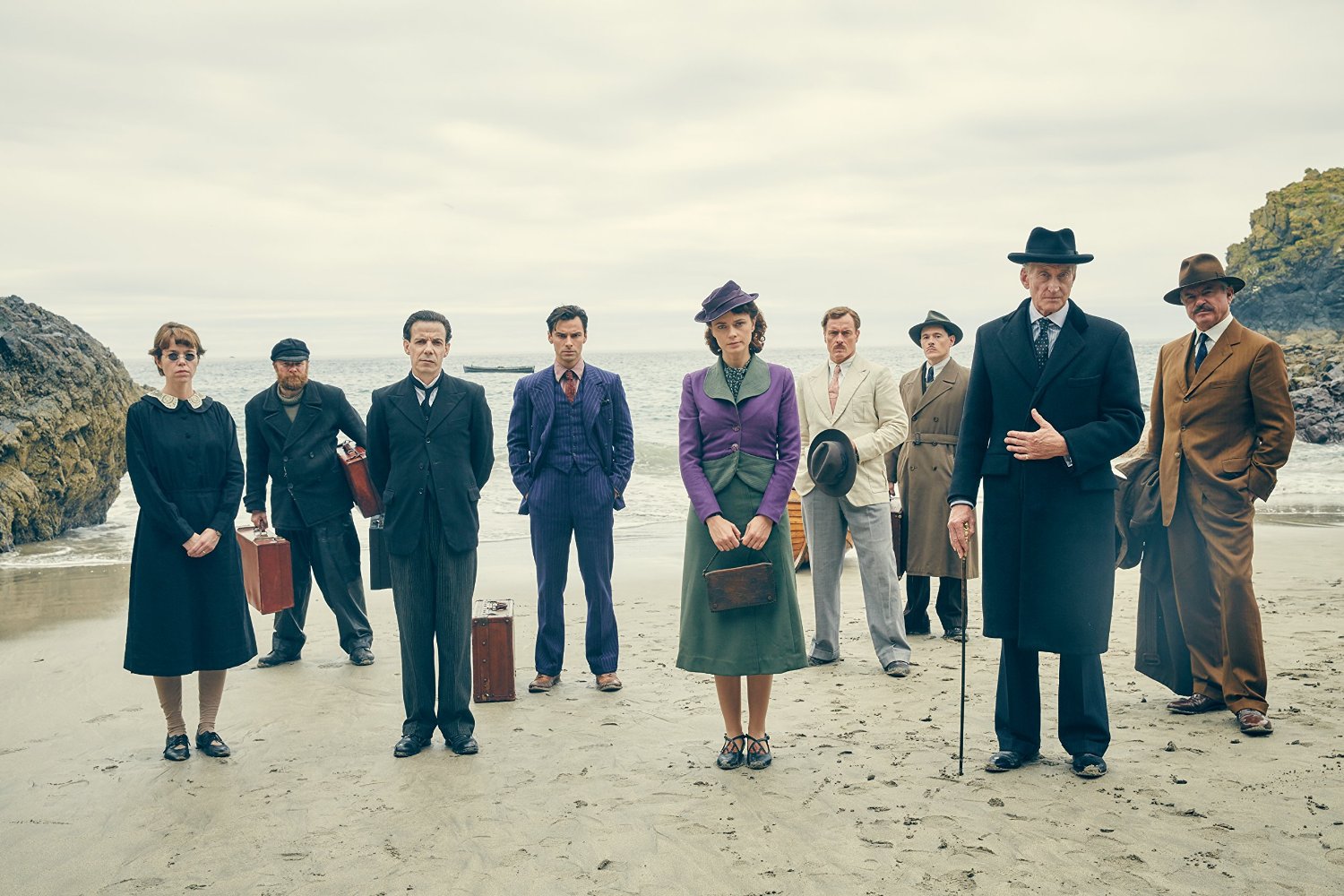 The characters arrive on the island - (l to r) Anna Maxwell Martin, Christopher Hatherall, Noah Taylor, Aidan Turner, Maeve Dermody, Toby Stephens, Burn Gorman, Charles Dance, Sam Neill in And Then There Were None (2015)