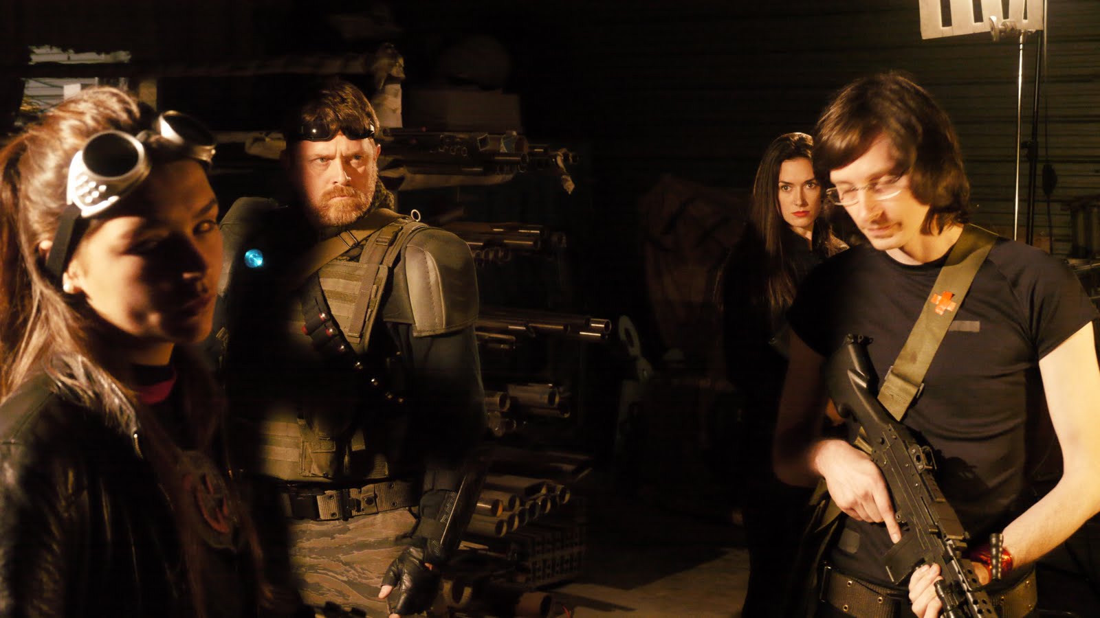 The mercenaries prepare to enter the facility - (l to r) Juanita Arias, Joe Chapman, Virginia Logan and Nat Cassidy in Android Insurrection (2012)