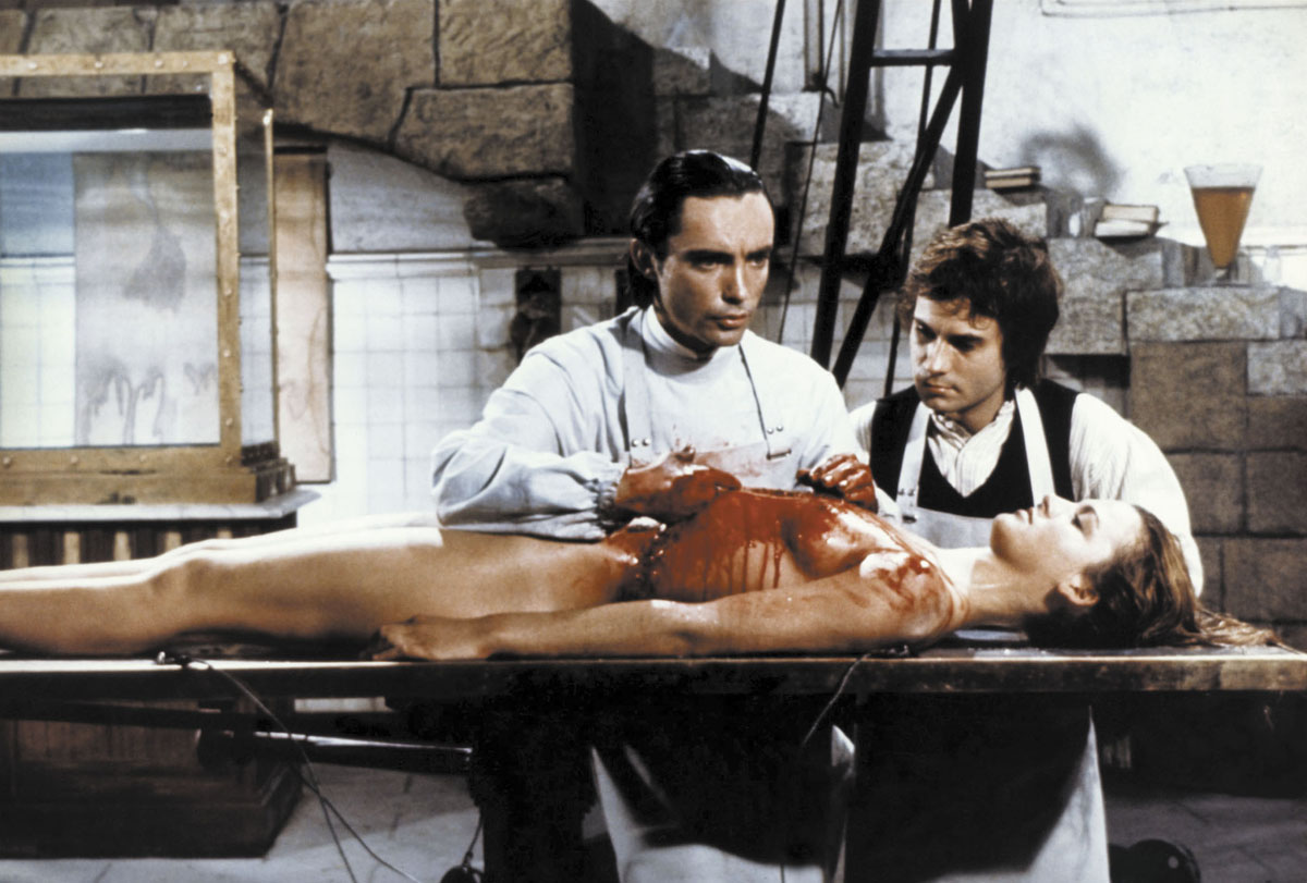 (l to r) Baron Frankenstein (Udo Kier) and assistant Otto (Arno Juerging) at work on the corpse of Dalila Di Lazzaro in Andy Warhol's Frankenstein (1973)