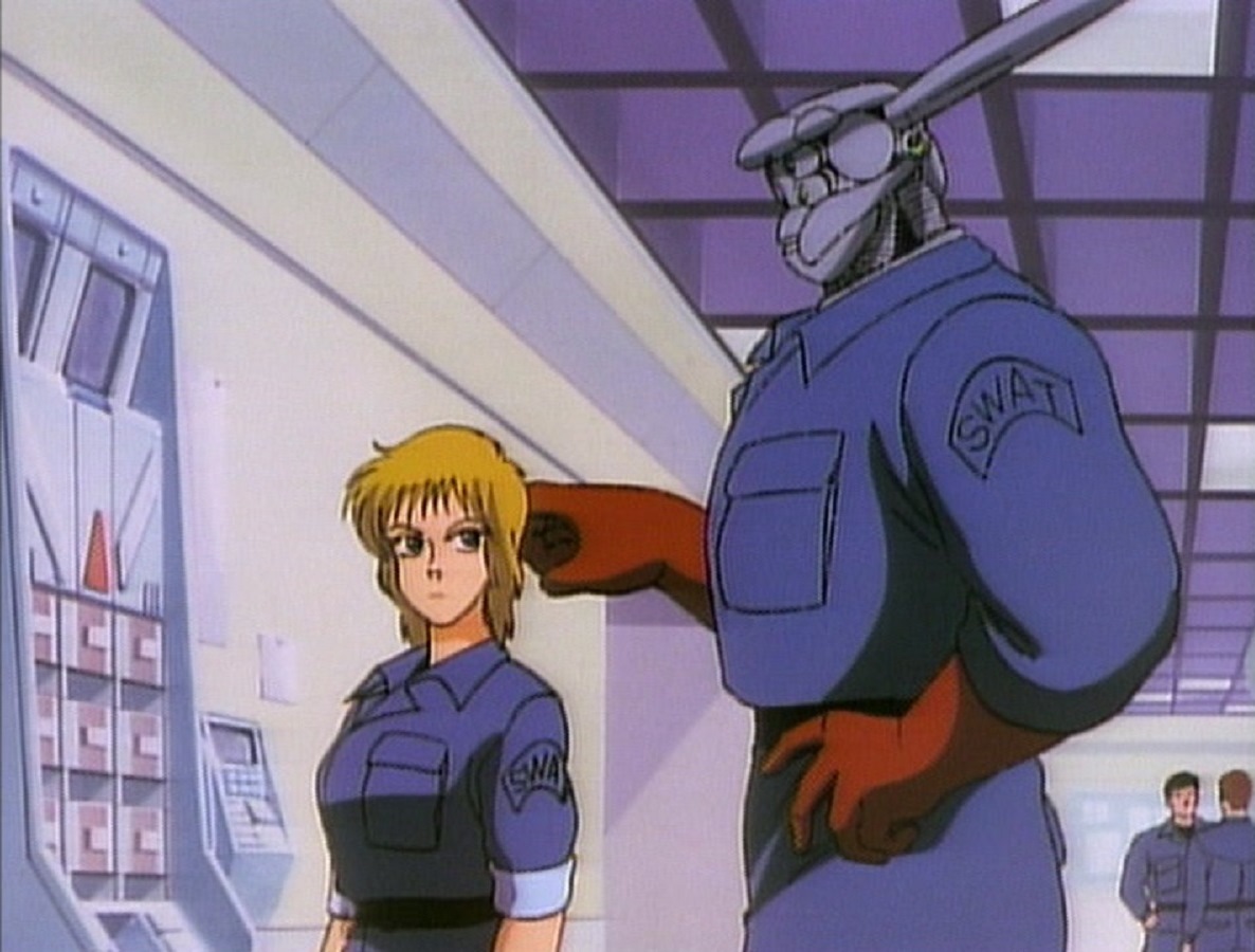 SWAT officers Nan Doonan and her cyborg partner Briareos in Appleseed (1988)