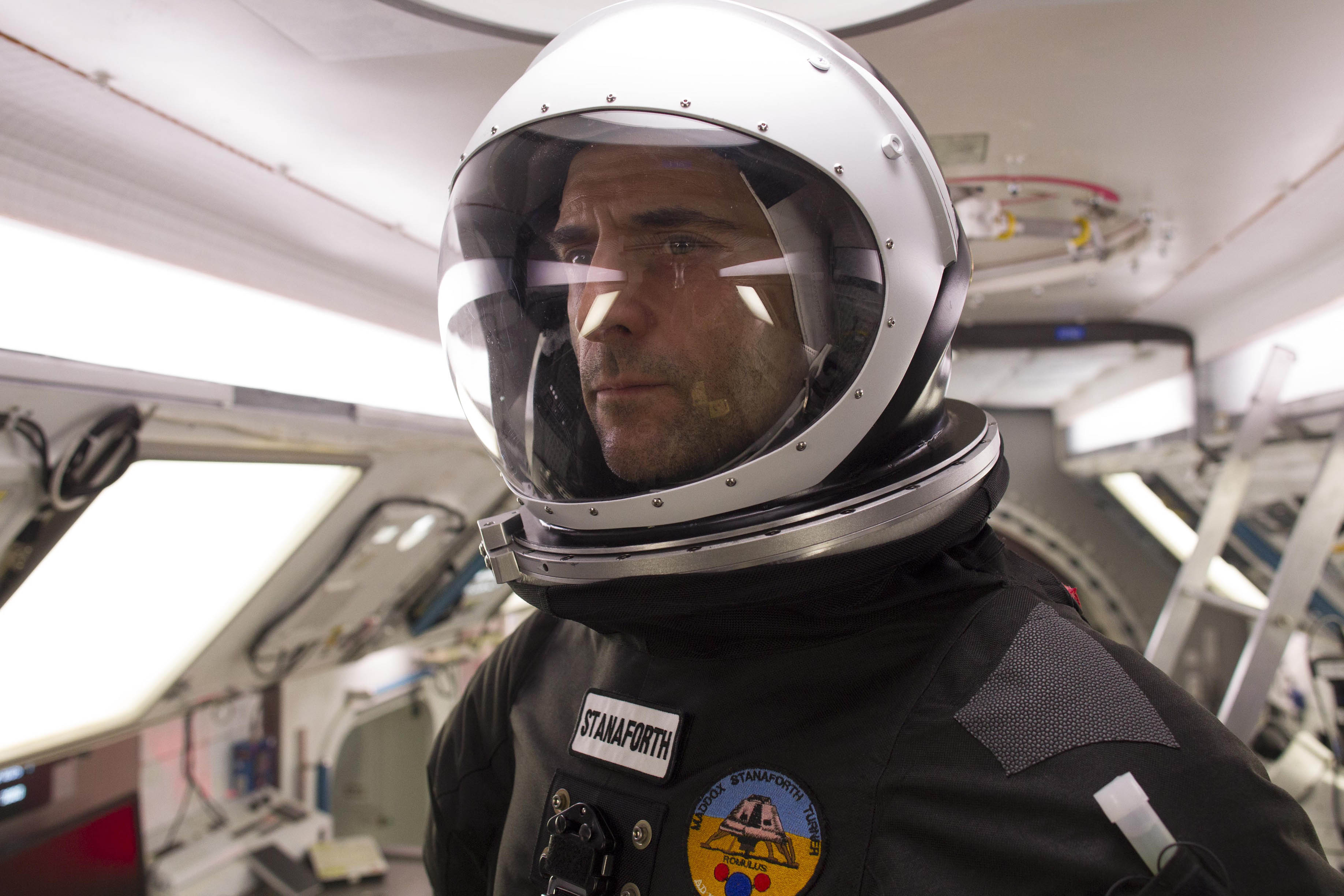 Mark Strong as a lone astronaut on a mission to Mars in Approaching the Unknown (2016)
