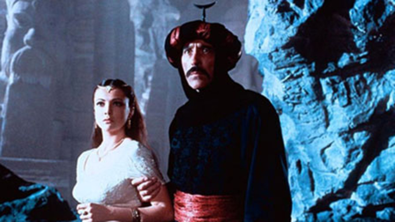 The Princess Zuliera (Emma Samms) is held prisoner by the evil Caliph Alquazar (Christopher Lee) in Arabian Adventure (1979)