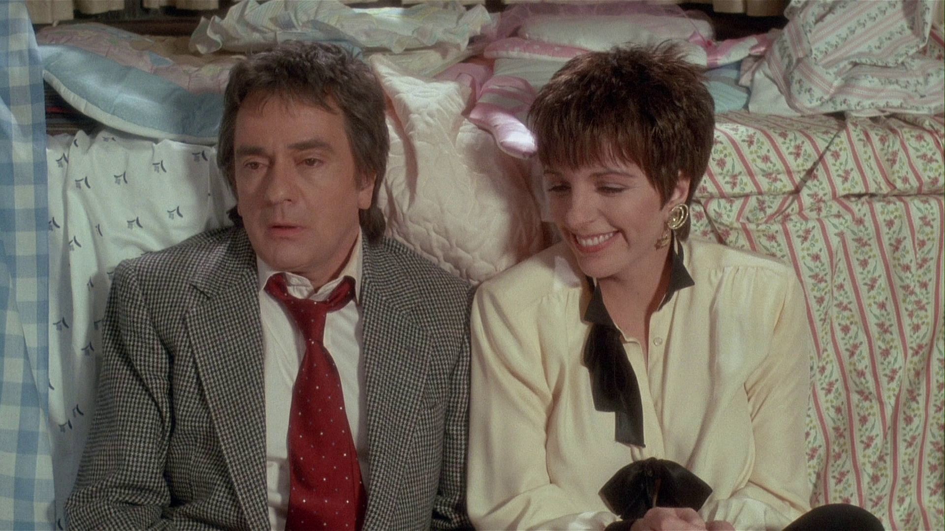 Millionaire Arthur (Dudley Moore) and his wife Liza Minelli find themselves down on their luck in Arthur 2: On the Rocks (1988)