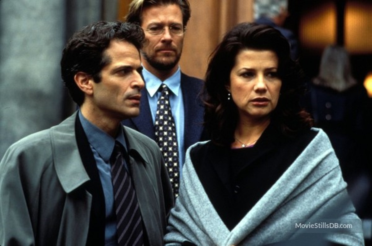 Stewart Bick (l) with accused Daphne Zuniga (r) in Artificial Lies (1999)