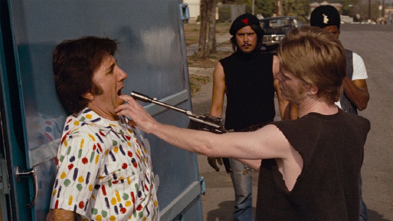 The gang members terrorise a family at an ice cream truck in Assault on Precinct 13 (1976)