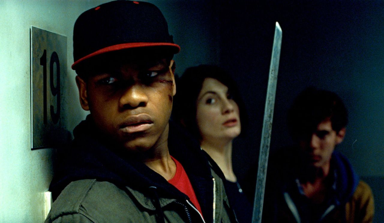 Leading the attack back against the alien threat - (front to back) John Boyega, Jodie Whittaker, Luke Tredaway in Attack the Block (2011)