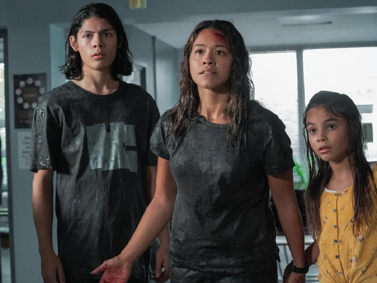 Mother Gina Rodriguez with son Lucius Hoyos and daughter Ariana Greenblatt in Awake (2021)