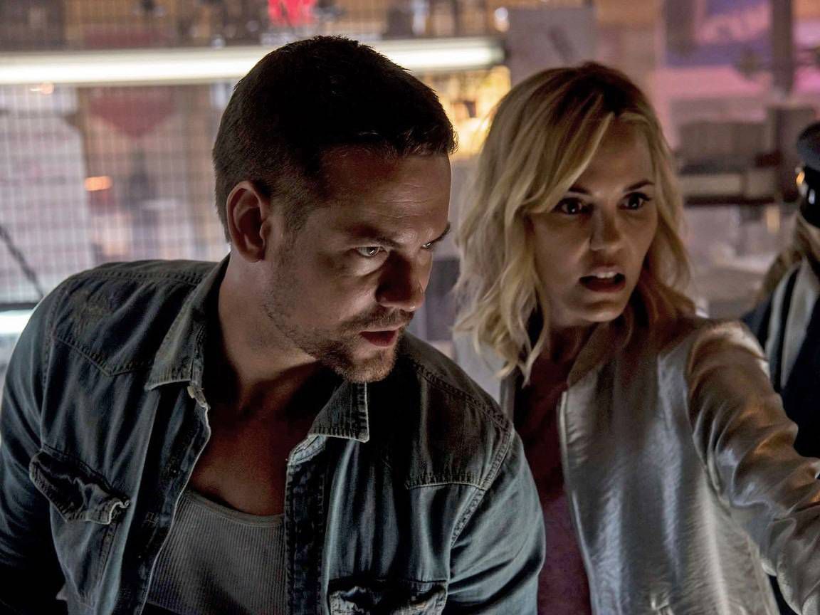 Husband and wife Shane West and Leslie Bibb make a discovery amid the contents of a storage locker in Awakening the Zodiac (2017)