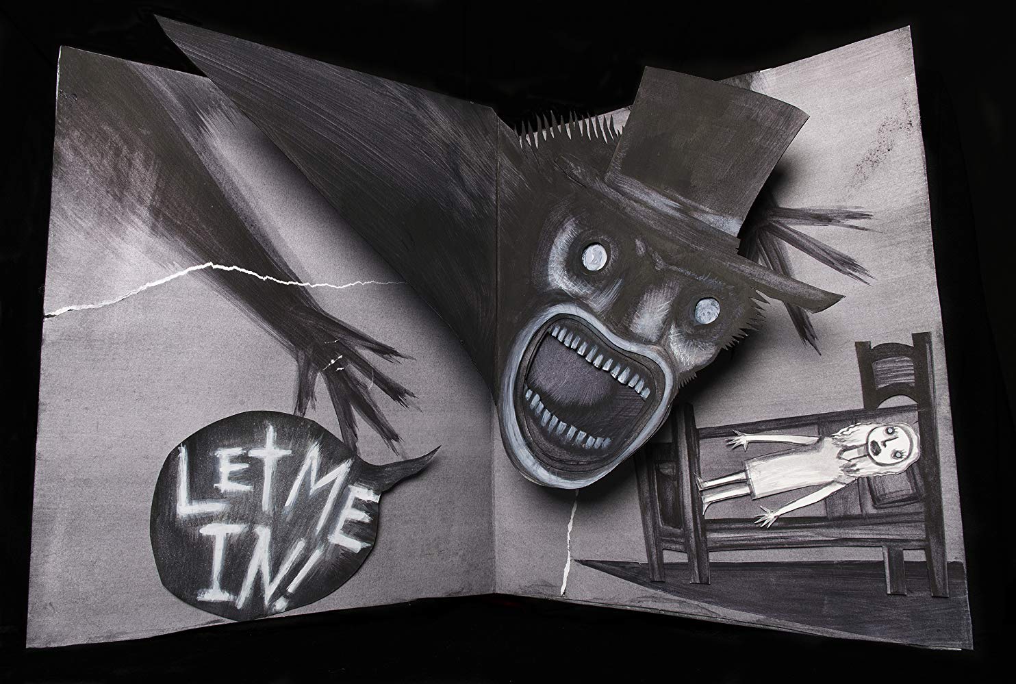 The Babadook emerges from a children's story in The Babadook (2014)