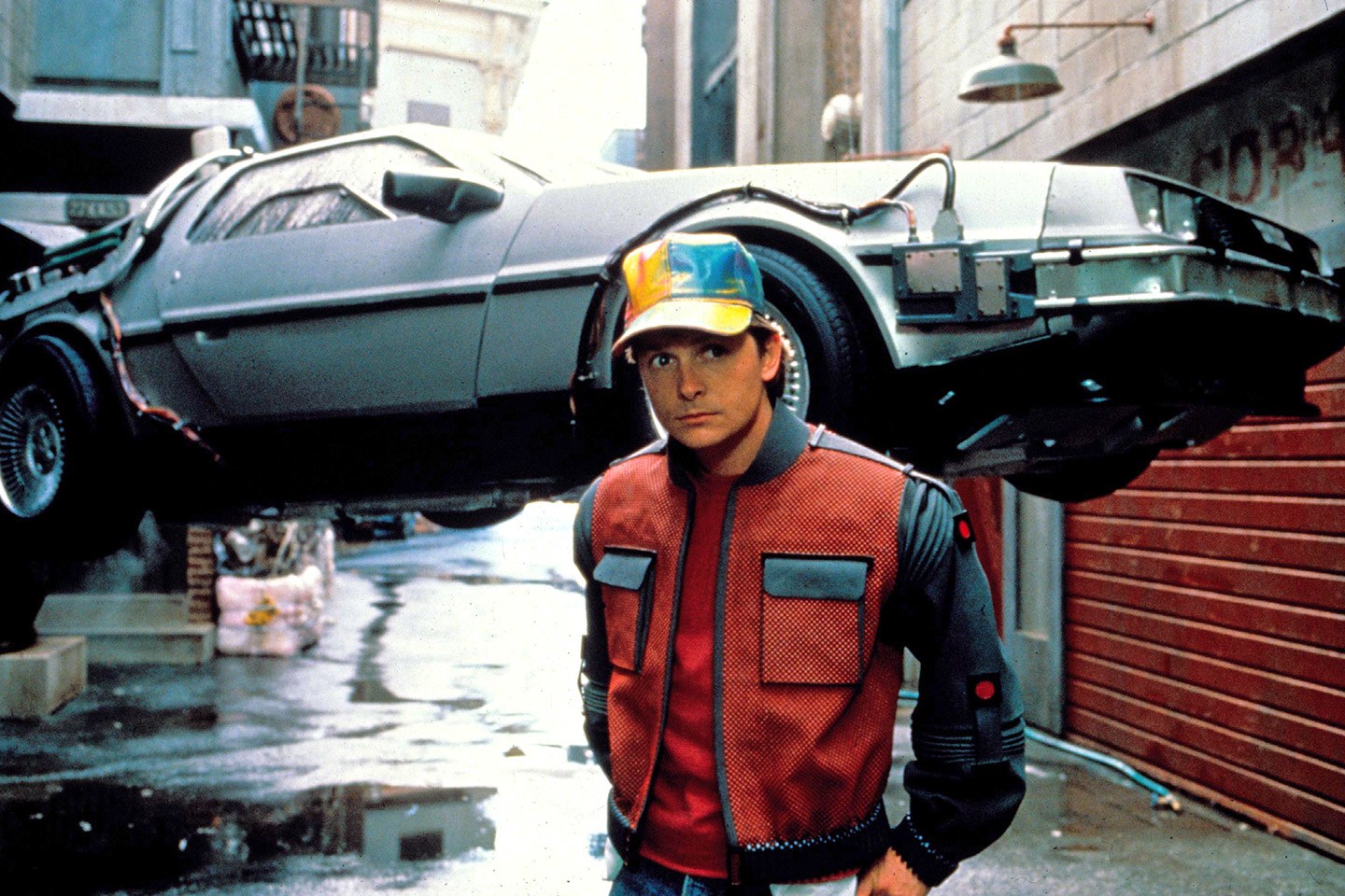 Marty McFly (Michael J. Fox) with flying DeLorean visits the future in Back to the Future Part II (1989)