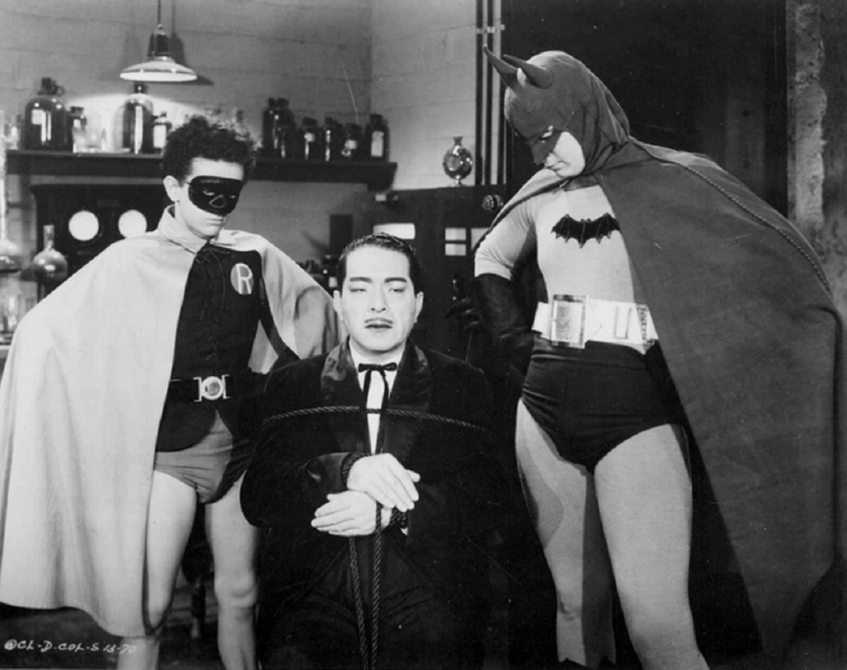 Batman (Lewis Wilson) and Robin (Douglas Croft) flank Prince Tito Daka (J. Carrol Naish) in Batman (1943)