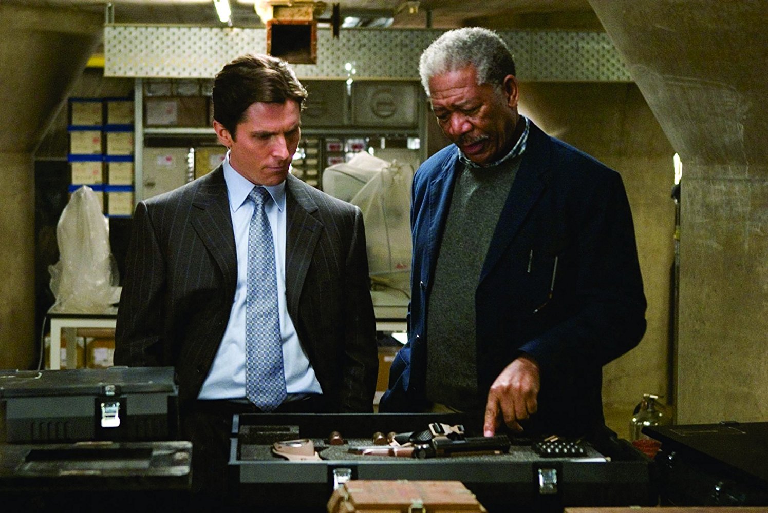 Bruce Wayne (Christian Bale) and Lucius Fox (Morgan Freeman) in Batman Begins (2005)