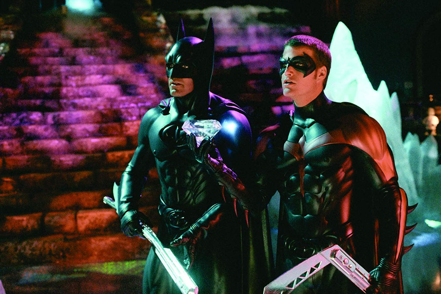 Batman (George Clooney) and Robin (Chris O'Donnell) on ice skates in Batman & Robin (1997)