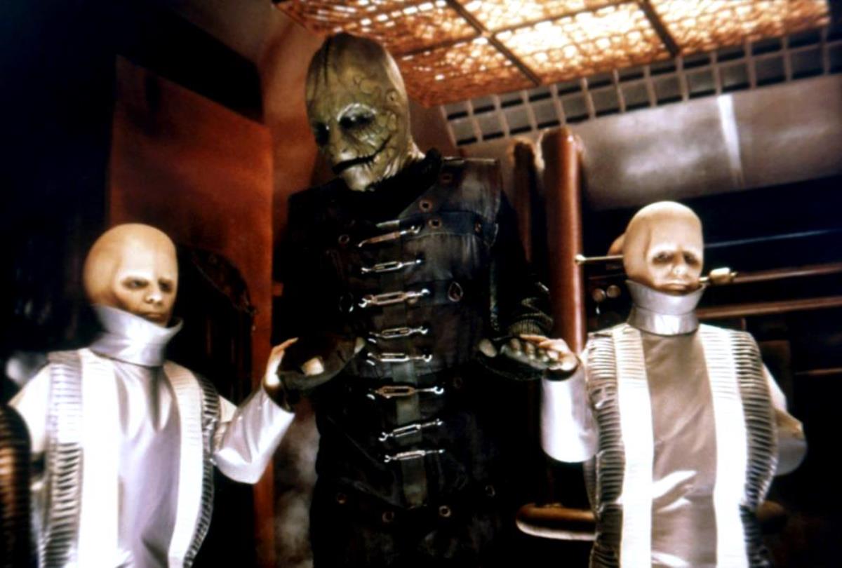 The reptilian Cayman flanked by two of the Nestor clones in Battle Beyond the Stars (1980)