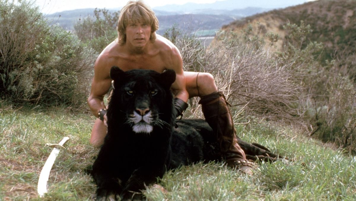 Marc Singer as Dar with Ruh the tiger in The Beastmaster (1982)