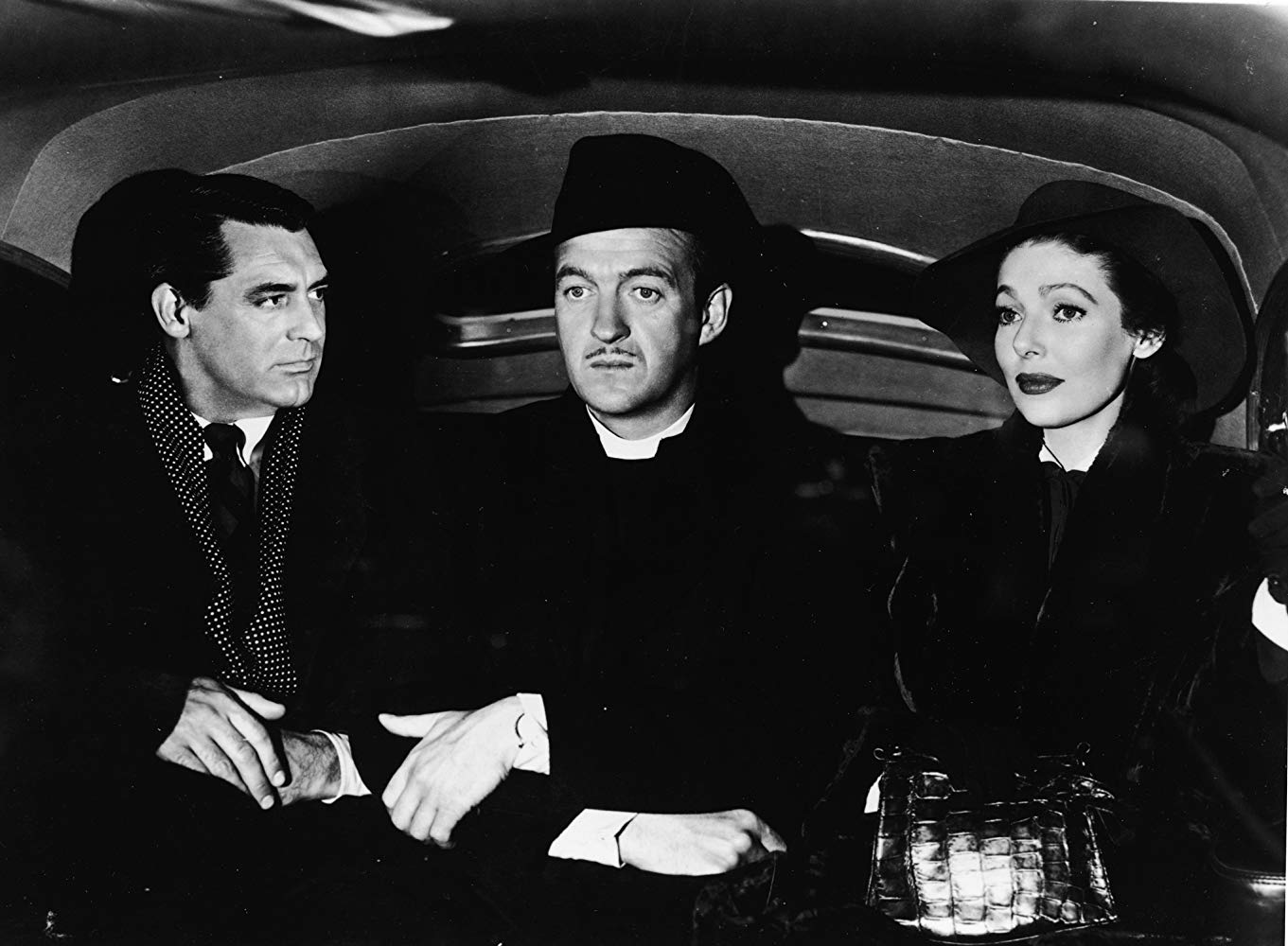 (l to r0 The angel Dudley (Cary Grant), bishop David Niven and the bishop's wife Loretta Young in The Bishop's Wife (1947)