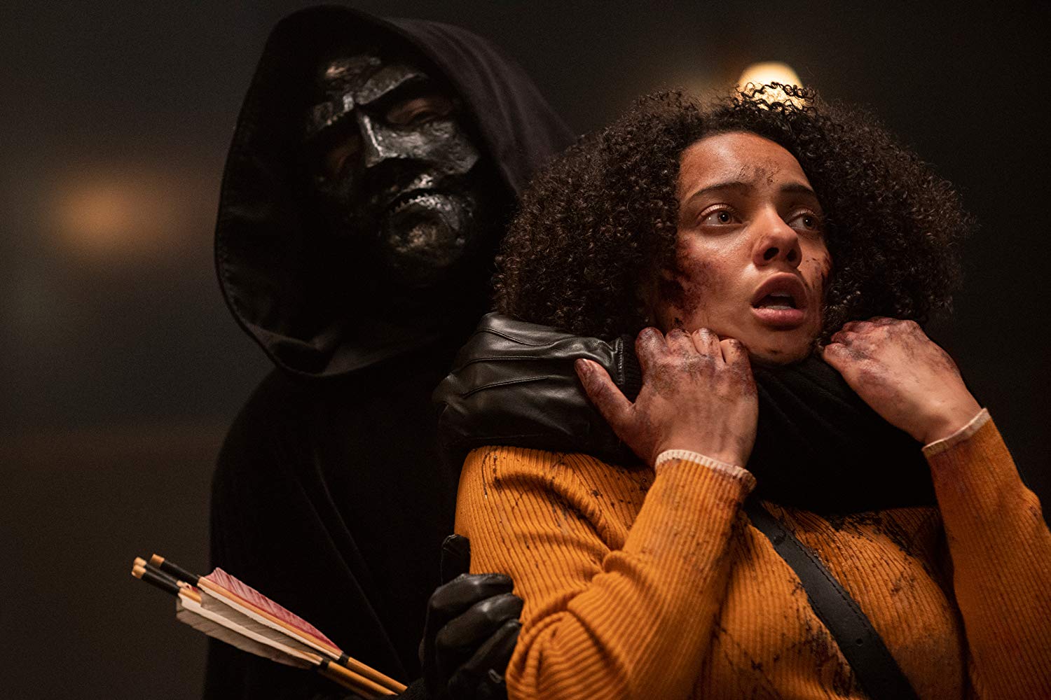 Aleyse Shannon comes under attack by one of the mind-controlled fraternity members in Black Christmas (2019)