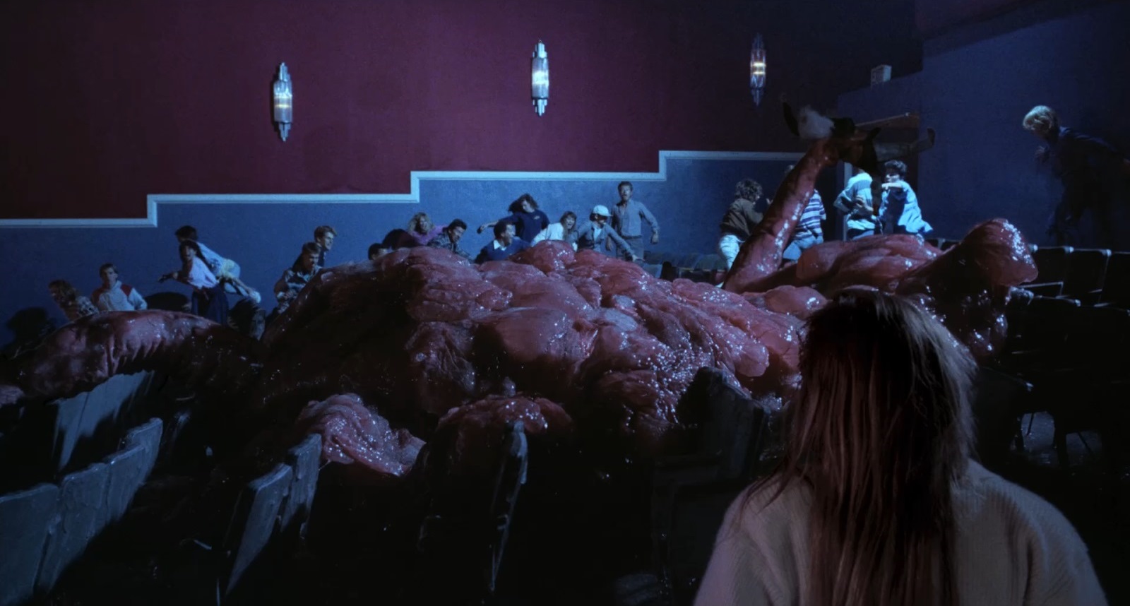 The Blob invades a movie theatre in The Blob (1988)
