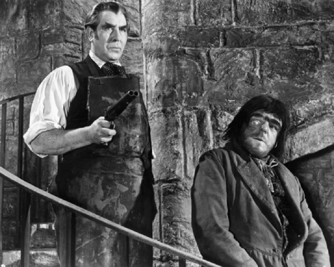 (l to r) Dr Callistratus (Donald Wolfit) and Victor Maddern as the hunchback Carl in Blood of the Vampire (1958)